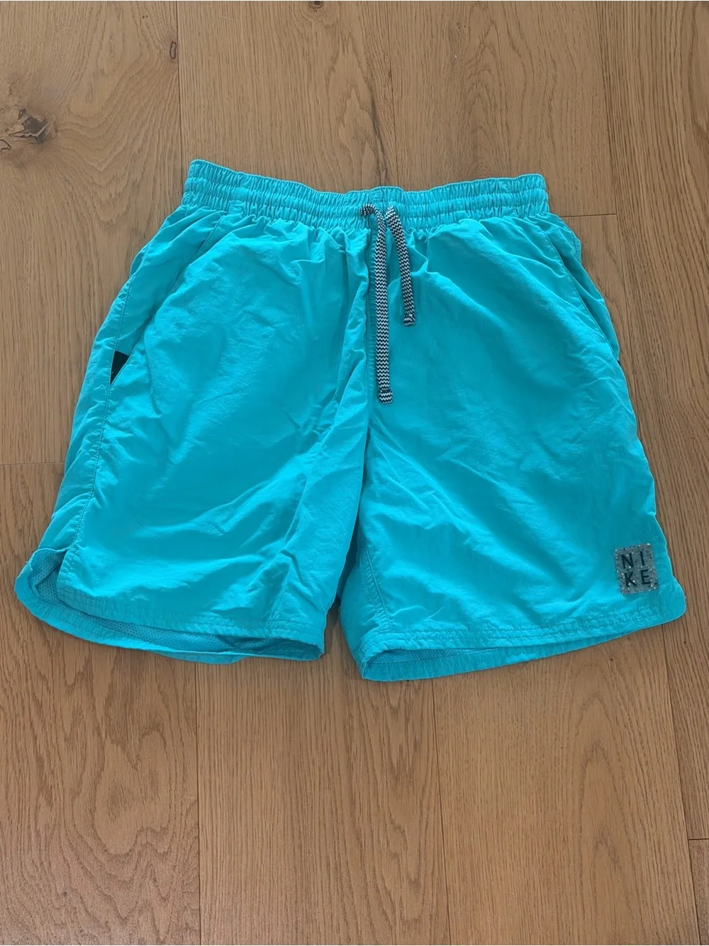 Nike Men’s Aqua Blue Swim Trunks